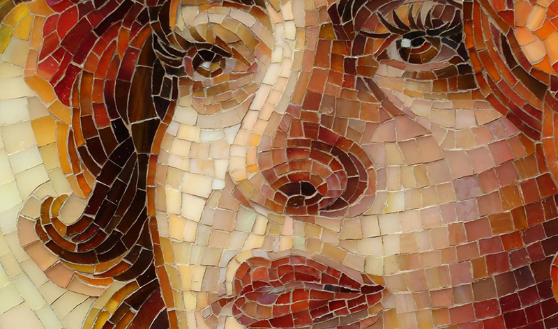 A mosaic art of a woman’s face